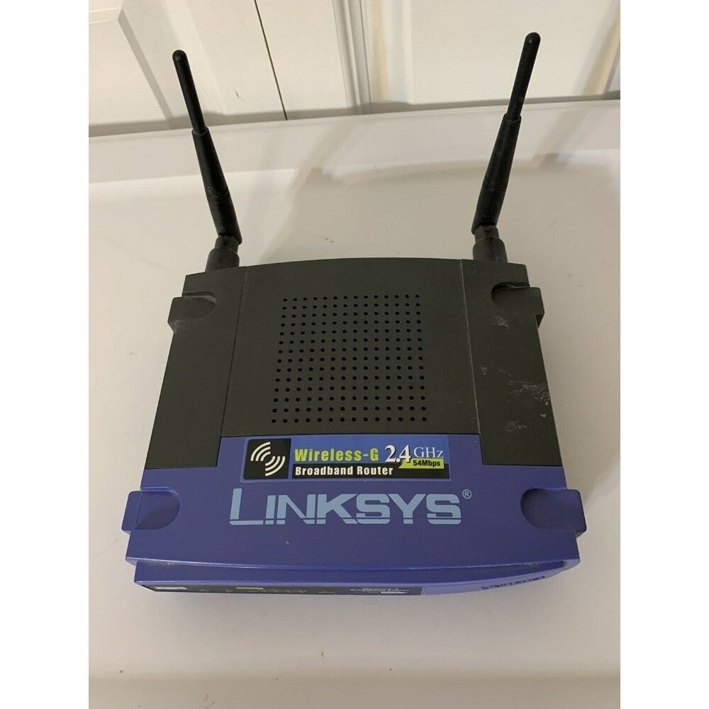 LINKSYS WRT54G  WIRELESS-G 2.4 GHZ BROADBAND ROUTER (No‎ Power Chord)